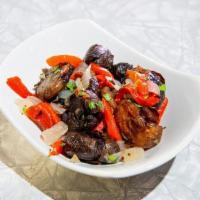 Breakfast Potatoes · Crispy Tricolor Potatoes, Roasted Peppers and Caramelized Onions
