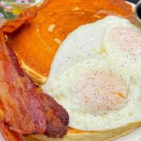 Richard's Special · Two eggs any style, two pancakes, served with your choice of bacon, Canadian bacon or sausage