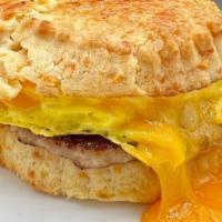 Big Ol' Biscuit Sandwich · Cheddar cheese biscuit, scrambled eggs, cheddar cheese with choice of sausage patty, bacon, ...