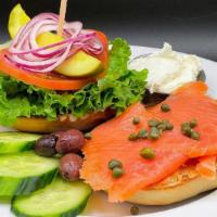 Lox & Bagel Platter · Toasted bagel, cream cheese, tomato, cucumber, red onions, capers & olives served with a cup...