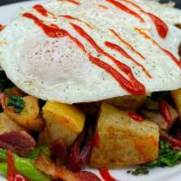Smoked Brisket Hash · Smoked brisket, sweet potatoes, apples, bacon, kale, broccolini, topped with two poached egg...
