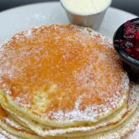Lemon Ricotta Pancakes · Three lemon ricotta pancakes served with Mascarpone whipped cream & blueberry compote