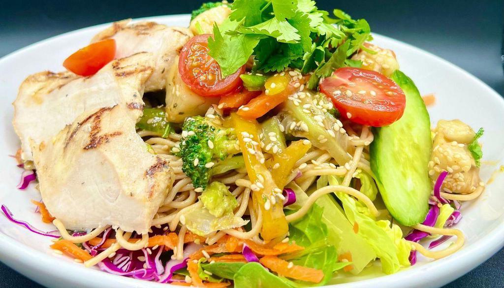 Thai Chicken Salad · Chicken breast, mixed greens, crunchy veggies, noodles, tomato, cucumber, cilantro, sesame seeds, served with Thai dressing