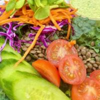 Tahini Lentil Salad · Mixed greens, kale, lentils, cabbage, roasted veggies, tomato, cucumber, pumpkin seeds, sesa...