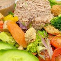 Tuna Salad Salad · Tuna salad on top of crunchy veggies, mixed greens, tomato, cucumber, croutons, served with ...