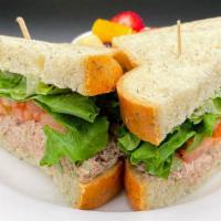 Carol's Tuna Sandwich · Tuna mixed with celery & mayo, with lettuce, tomato, served on herb bread
