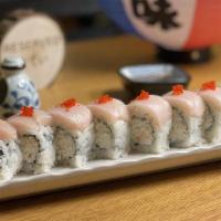 Raiders Roll · Crabmeat, avocado topped with hamachi, and tobiko.