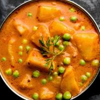 Aloo Mutter (with Rice) · Delicious potatoes and fresh peas cooked with our homemade Himalayan sauce. Comes with white...