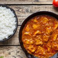 Chicken Tikka Masala (with Rice) · Classic Chicken Tikka Masala cooked in mild spiced cream, butter, and tomato sauce with Hima...