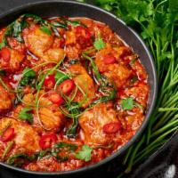 Chicken Vindaloo (with Rice) · Boneless Chicken cooked with fresh potato, tomato, onion sauce and homemade Himalayan spices...