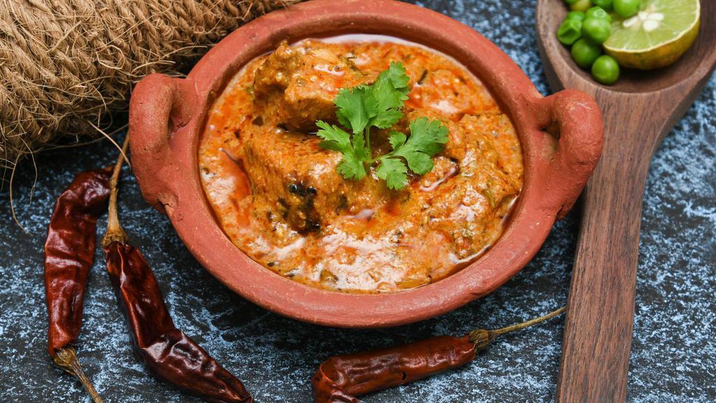 Kadai Chicken (with Rice) · Chicken cooked with chopped bell peppers, tomato, onion and our chef's special Himalayan homemade kadai spices.