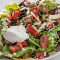 Taco Salad · Choice of meat or beans with lettuce, salsa fresca, sour cream, guacamole, cheese and olives...