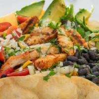 Baja Salad · Flour shell with lettuce, black beans, chicken breast, avocado, salsa fresca, cilantro, chee...