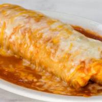 Wet Burrito · Rice, beans, salsa, choice of meat with melted cheese and enchilada sauce.