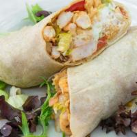 Shrimp Burrito · Shrimp sauteed in garlic and butter with rice, grilled onions, bell peppers, pineapple salsa...