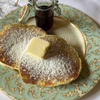 Plain Pancakes · 2 large buttermilk pancakes, served with butter and syrup.
