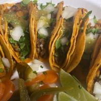 Tacos · Your choice of meat, onions and cilantro