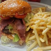 Cheeseburger · Cheese, lettuce, tomato, onions, ketchup, mayo, mustard. Served with fries