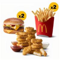 Classic Quarter Pounder With Cheese Pack  · Quarter Pounder with Cheese (x2), Medium French Fries (x2), 20 pc McNuggets