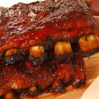 Sweet & Savory Ribs (Half Rack) · Half rack of ribs cooked with our sweet and savory BBQ sauce.