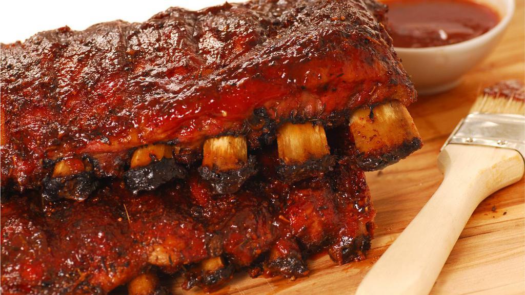 Sweet & Savory Ribs (Half Rack) · Half rack of ribs cooked with our sweet and savory BBQ sauce.