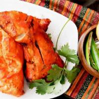 14. Tandoori Chicken · Choice of leg or breast, marinated in homemade yogurt, sea salt, freshly ground spices, lemo...
