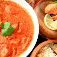 28. Tikka Masala · Classic masala sauce, yogurt, sea salt, fresh tomatoes, caramelized onion sauce, garnished w...