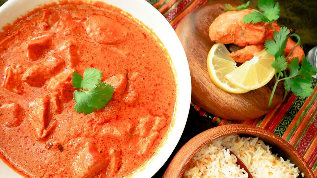 28. Tikka Masala · Classic masala sauce, yogurt, sea salt, fresh tomatoes, caramelized onion sauce, garnished with exotic spices and herbs.