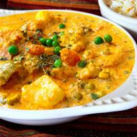 Korma Veggie Curry · light creamy sauce flavored with saffron yogurt and your choice of vegetable