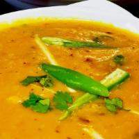 Tarka Daal · thick and tasty yellow daal (lentil) cooked with spice-infused oil for a deep, and rich flav...