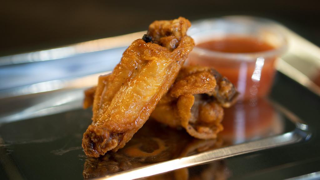 Original Hot · Beautifully crispy yet moist chicken wings, 10 pieces per flavor. The name of the flavor is the name of the sauce!