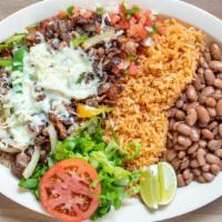 Alambre · Beef, bacon, bell pepper,  cheese,onions served with rice, beans,  and salad.
