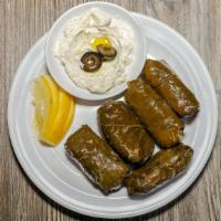 Dolma · Gluten free, vegetarian. Dolma comes with tzatziki in a separate container. Tzatziki is not ...