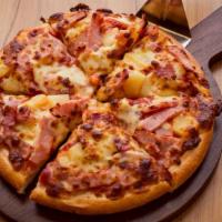 The Hawaiian Pizza · Real cheese on our traditional pizza sauce sitting on hand-rolled crust topped with beef pep...