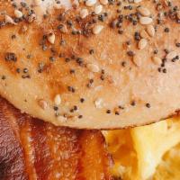Bacon Bagel Sandwich · Your choice of an Everything or Plain Bagel topped with Bacon, Egg, and Cheese.