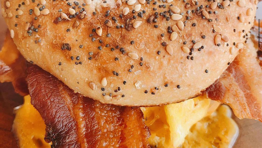 Bacon Bagel Sandwich · Your choice of an Everything or Plain Bagel topped with Bacon, Egg, and Cheese.