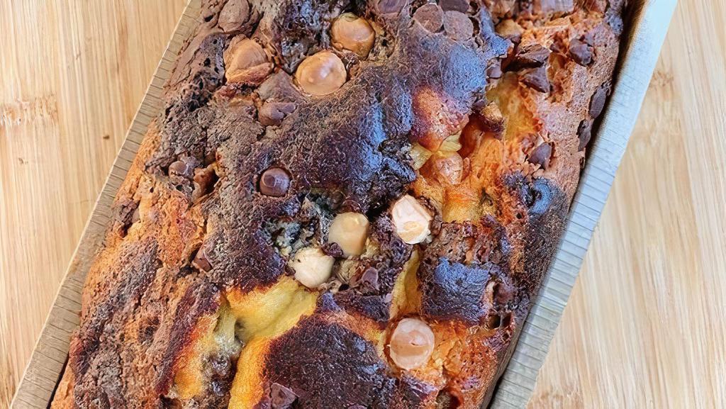 Chocolate Marble Loaf Cake · Greenlee's traditional chocolate loaf swirled in with vanilla. Topped with traditional chocolate chips and white chocolate chips.