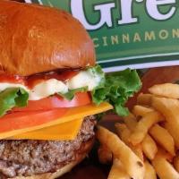 Greenlee's Half Pound Ribeye Burger · Brioche Bun topped with Half Pound Ribeye Burger, cheese of your choice, Lettuce, Tomato, an...