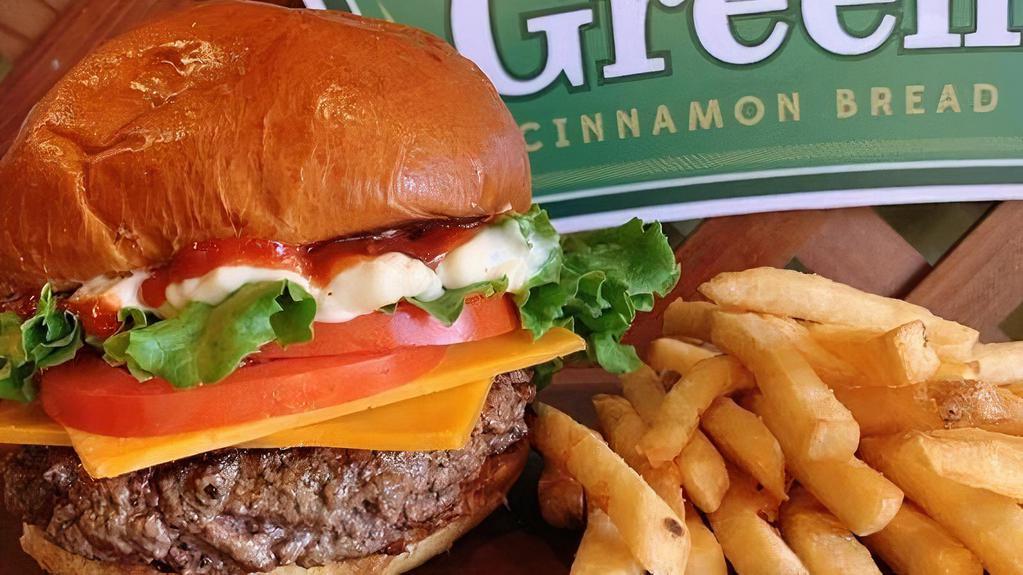 Greenlee's Half Pound Ribeye Burger · Brioche Bun topped with Half Pound Ribeye Burger, cheese of your choice, Lettuce, Tomato, and a Pickle!