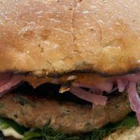 Lamb Burger · harissa, valbresso feta cheese, herbs, pickled onion, charred scallion aioli