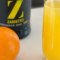 MIMOSA · Fresh squeezed orange juice & prosecco