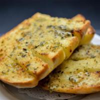 Baked Garlic Bread (side order) · Fresh Baked Francesi Bread with Garlic, Herbs and Parmesan
