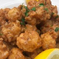 Cajun Rock Shrimp · Lightly Flour Dusted Fried Shrimp with Cajun Spices
