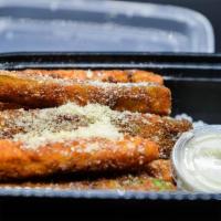 Fried Zucchini · Light Breading, Parmesan, House-Made Ranch Dressing