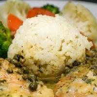 Chicken Breast Picatta · Breast of Chicken sautéed with Lemon Butter & Capers and served with Creamy Risotto and Sea...