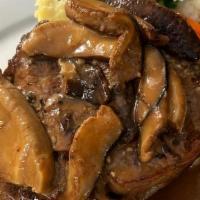 Veal Chop · Marinated with Fresh Herbs - Char-Broiled with Madeira Shitake Mushroom Sauce, served with M...