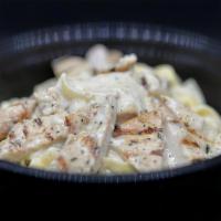 Fettuccine Alfredo with Chicken · Butter, Cream, Dash of Nutmeg and Parmesan Cheese