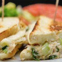 Crab Melt · Rock Crab Meat, Tomato, Scallions, Touch of Mayo, Mozzarella Cheese - Grilled on Sourdough