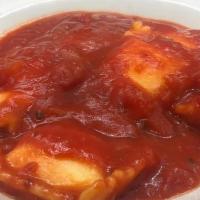 Kid's Cheese Ravioli · Choice of Alfredo or Tomato Sauce
