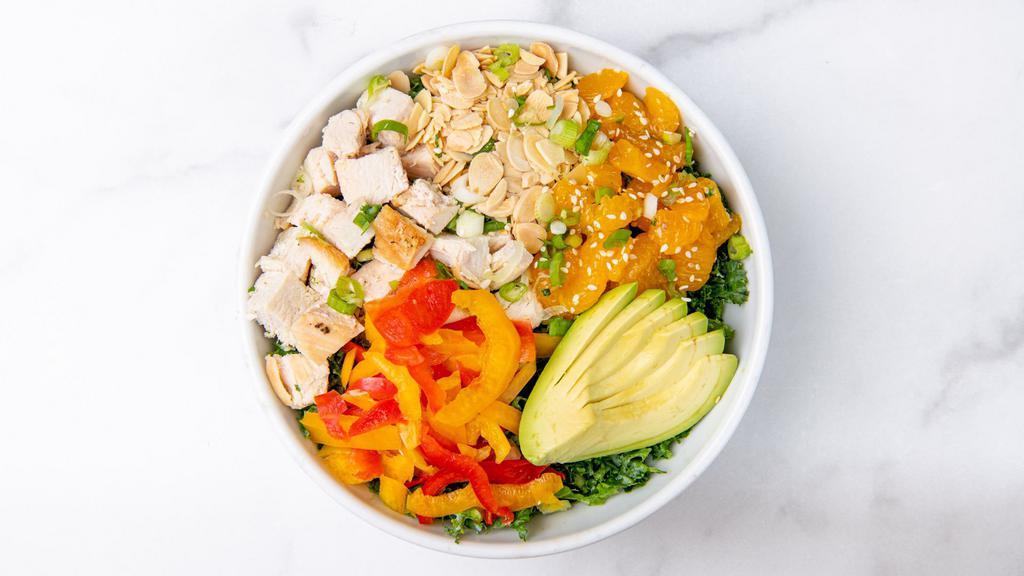 Sesame Chicken Salad · Chopped kale, marinated chicken, avocado, mandarin oranges, sliced peppers, roasted almonds, green onions, sesame seeds, and creamy sesame dressing (served on the side). (Gluten-free)